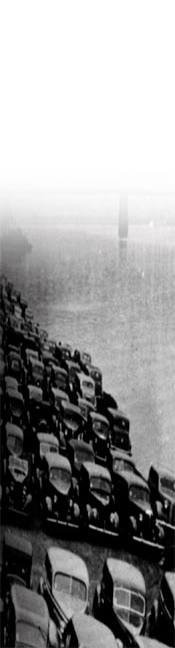 historical photo of cars on pittsburgh riverbank